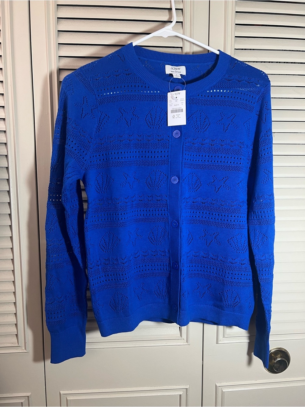 Seashell pointelle cardigan sweater